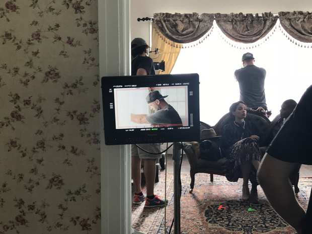 Behind the scenes: the parlor on the monitor.