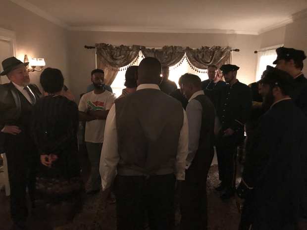 Behind the scenes: the hallway full of officers.