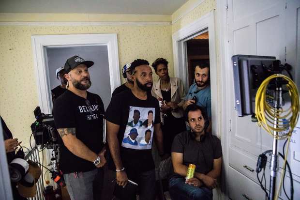 Behind the scenes: the crew watching playback.