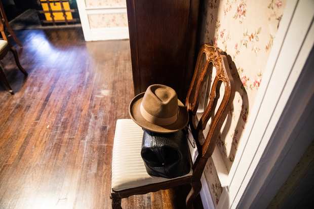Behind the scenes: a hat left on a chair.