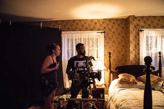 Behind the scenes: the bedroom set, lit.